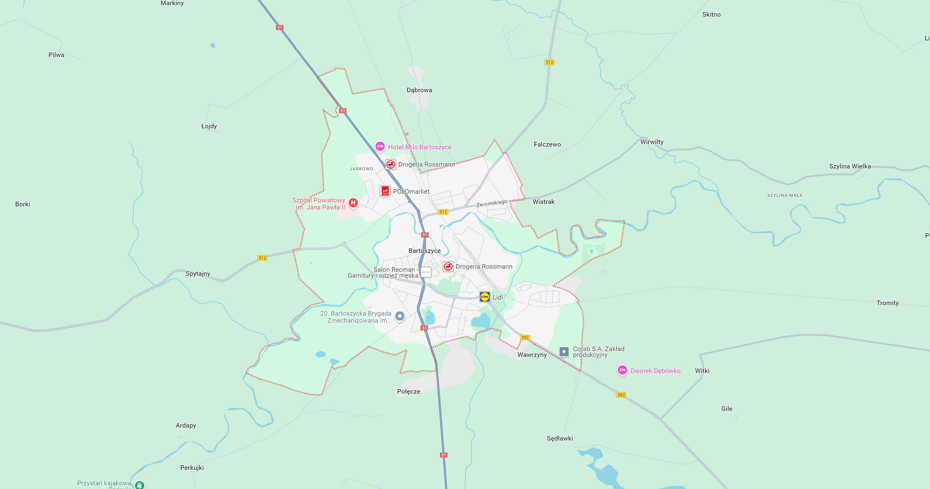 Mapa Bartoszyc, z wyraźnie zaznaczonymi granicami miasta, głównymi ulicami oraz lokalizacjami, takimi jak szpitale, sklepy i inne punkty usługowe. Idealna do orientacji przestrzennej i planowania podróży w regionie.