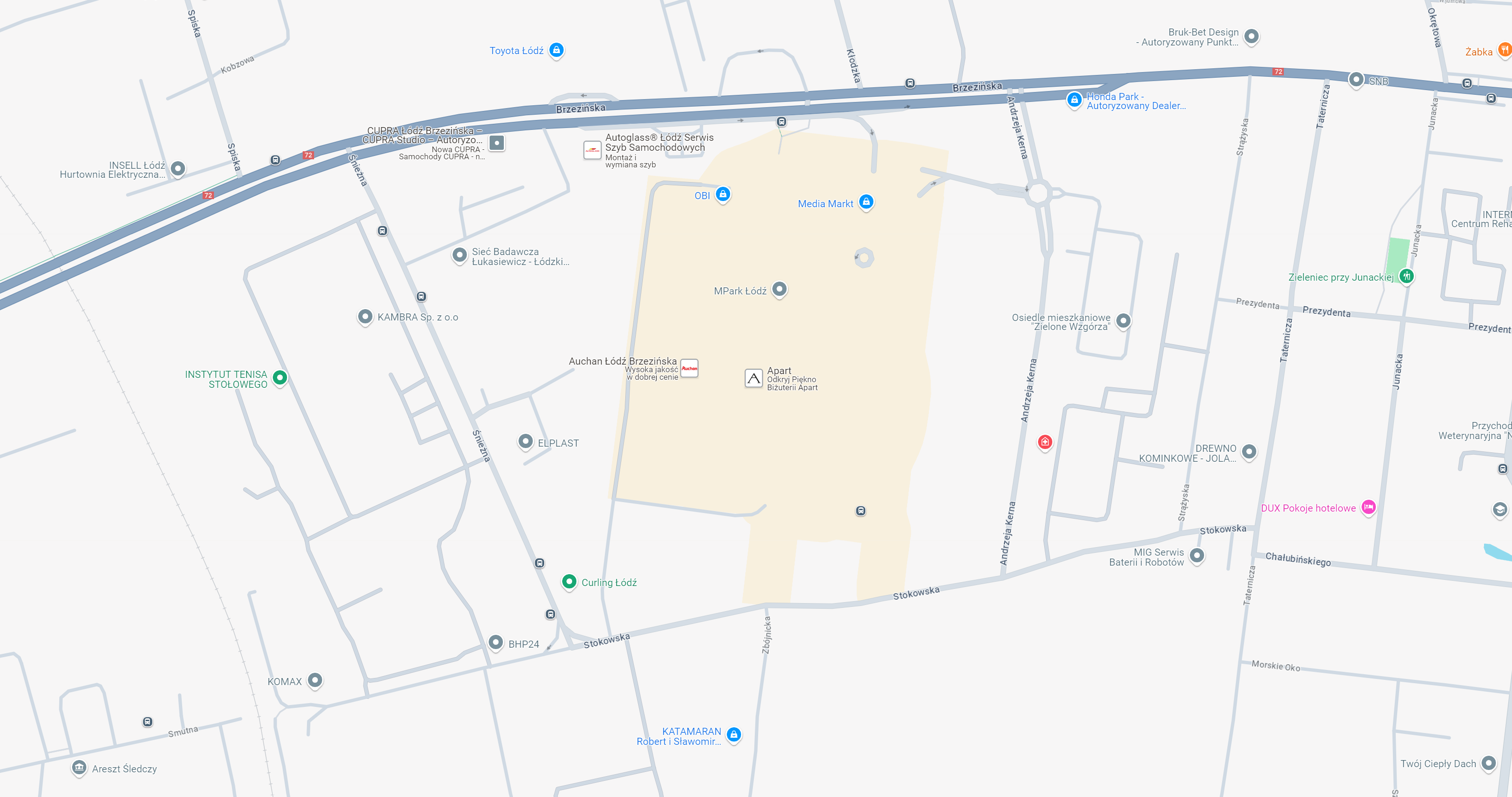 Mapa przedstawiająca okolice MPark Łódź, z wyraźnie oznaczonymi ulicami i sąsiadującymi obiektami handlowymi, takimi jak Auchan, Media Markt oraz instytucjami, co może być przydatne dla osób poszukujących myjni bezdotykowych w tej lokalizacji.
