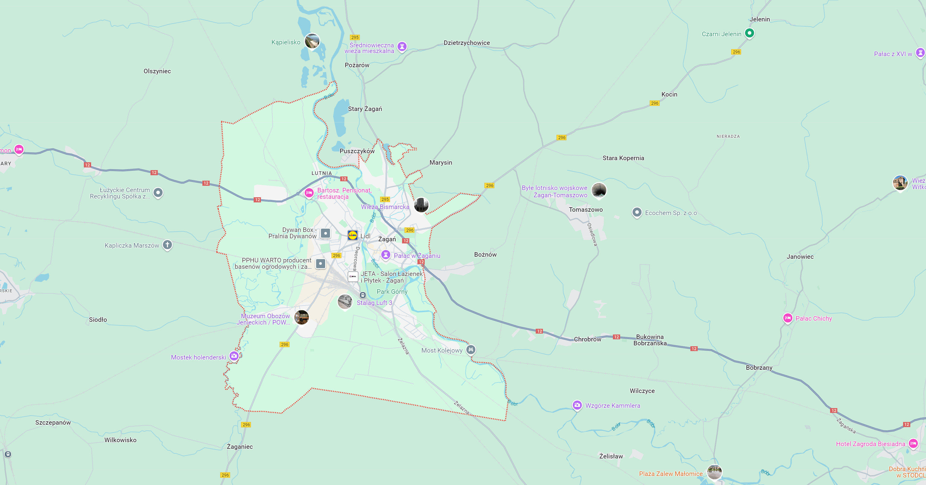 Mapa przedstawiająca obszar Żagania i okolice, z oznaczonymi drogami, miejscowościami oraz punktami użyteczności publicznej. Widoczne główne trasy, oznaczenia punktów gastronomicznych i atrakcji turystycznych. Idealna dla planowania podróży w regionie.
